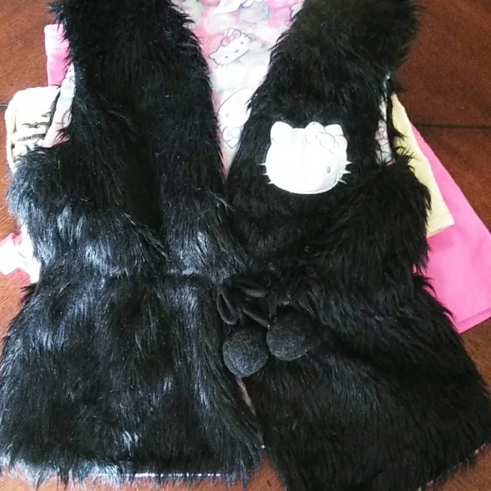 Hello kitty plush vest.
